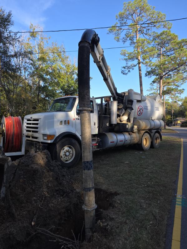 Hydrovac truck performing excavation